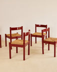 glossy red Carimate dining chairs by Vico Magistretti for Habitat