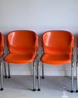 Set of x4 Orange Plastic Chairs
