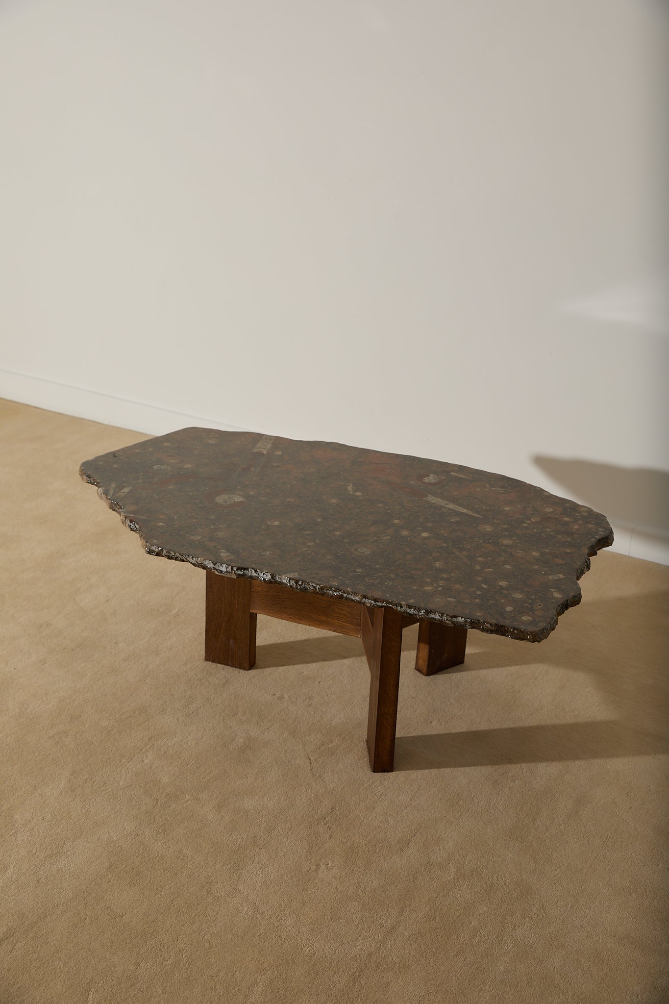 Primitive Orthoceras Fossil Cocktail Table – Devonian Limestone Slab on Wood Trestle Base