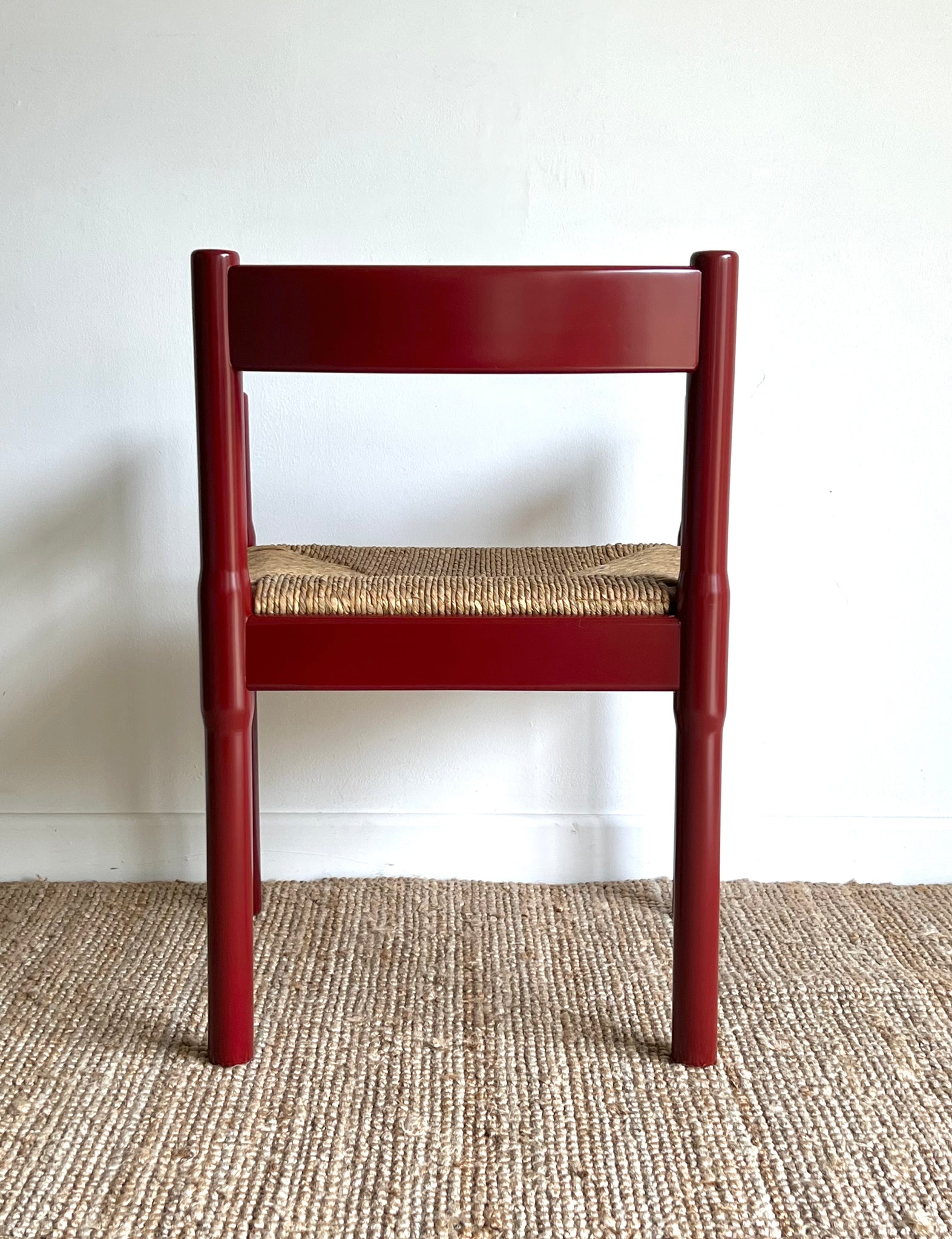 Oxblood Carimate Carver Chair by Vico Magistretti