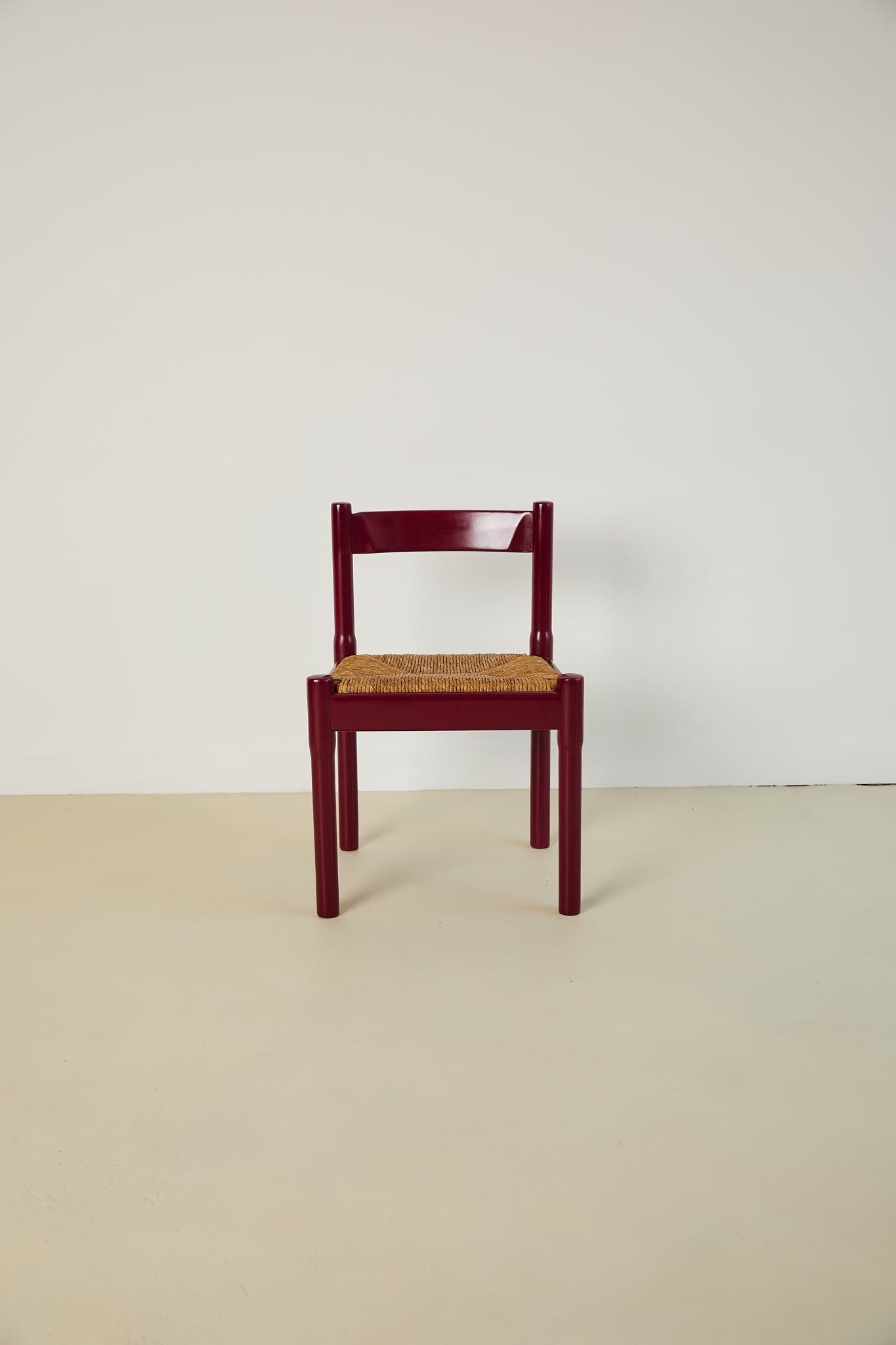 Set of x8 Burgundy Carimate Chairs by Vico Magistretti