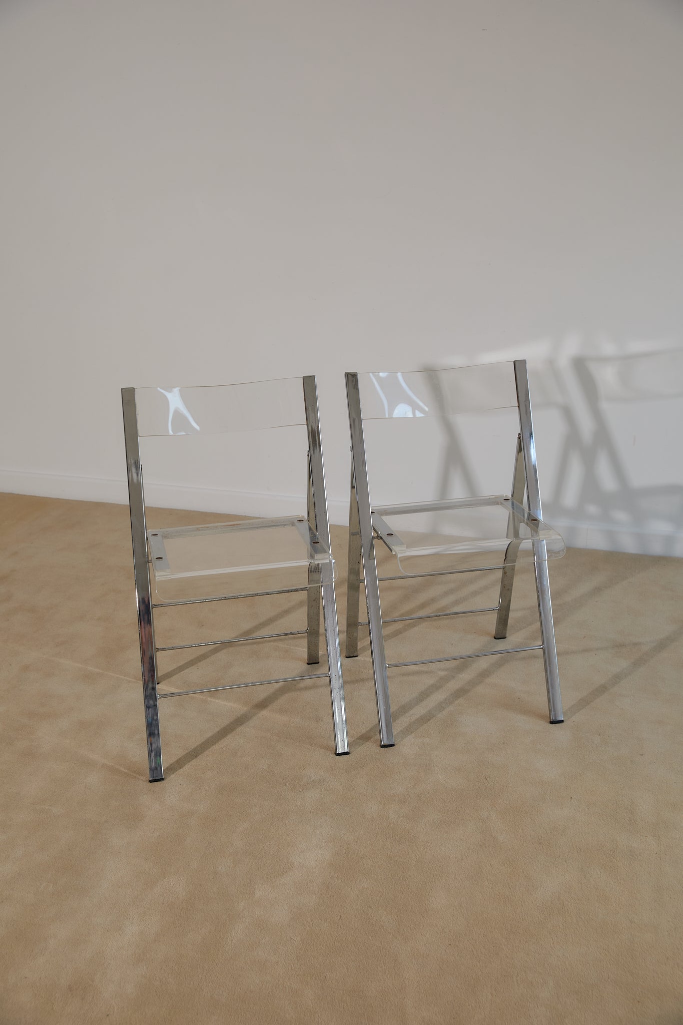Pair of Lucite and Chrome Folding Chairs