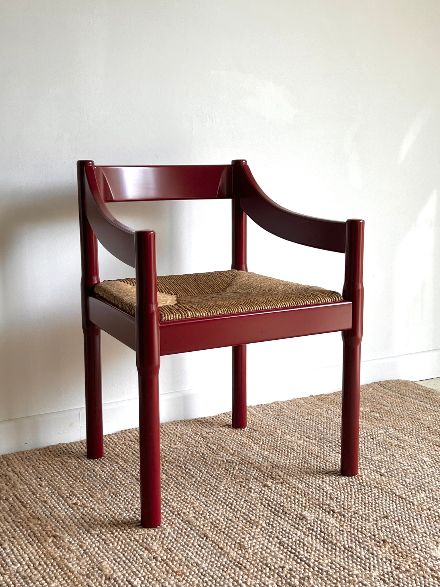 Oxblood Carimate Carver Chair by Vico Magistretti