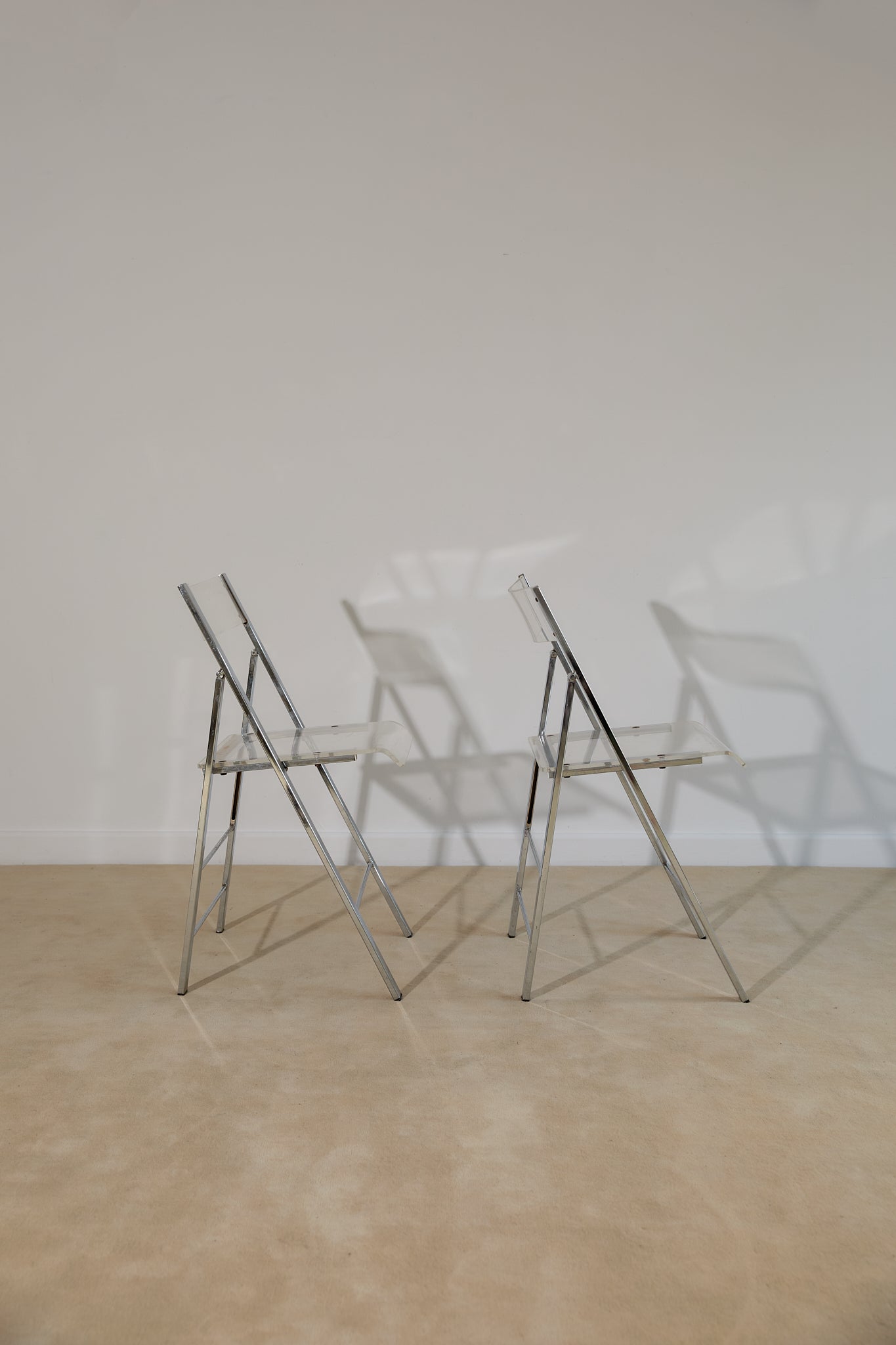 Pair of Lucite and Chrome Folding Chairs
