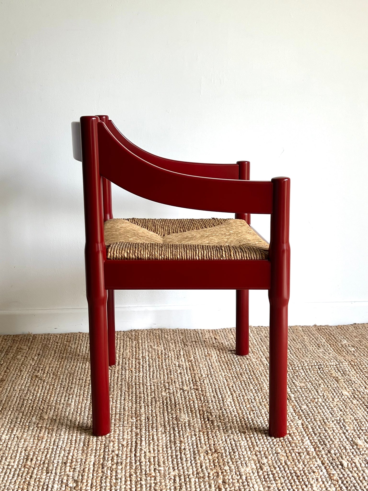 Oxblood Carimate Carver Chair by Vico Magistretti