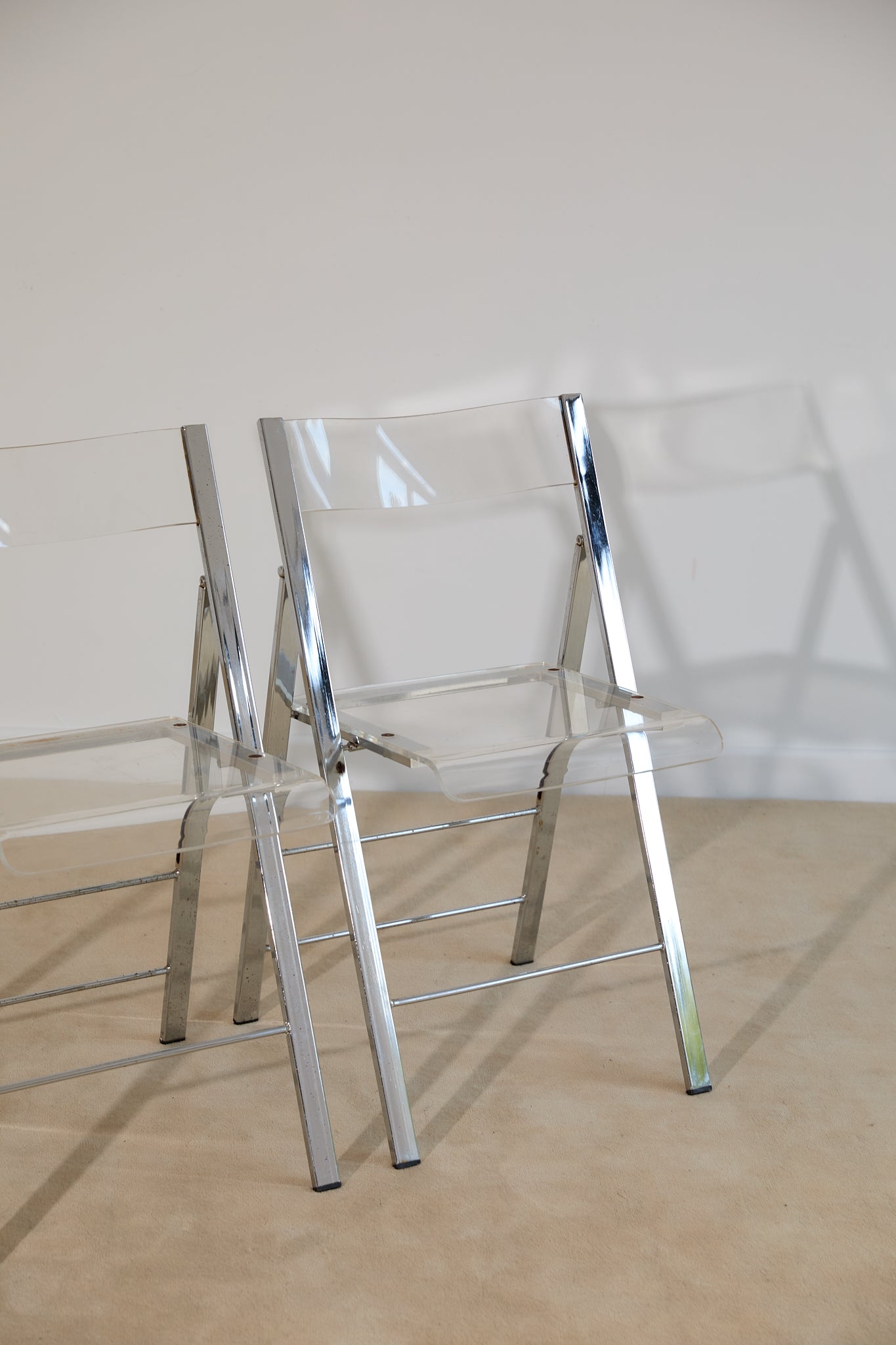 Pair of Lucite and Chrome Folding Chairs