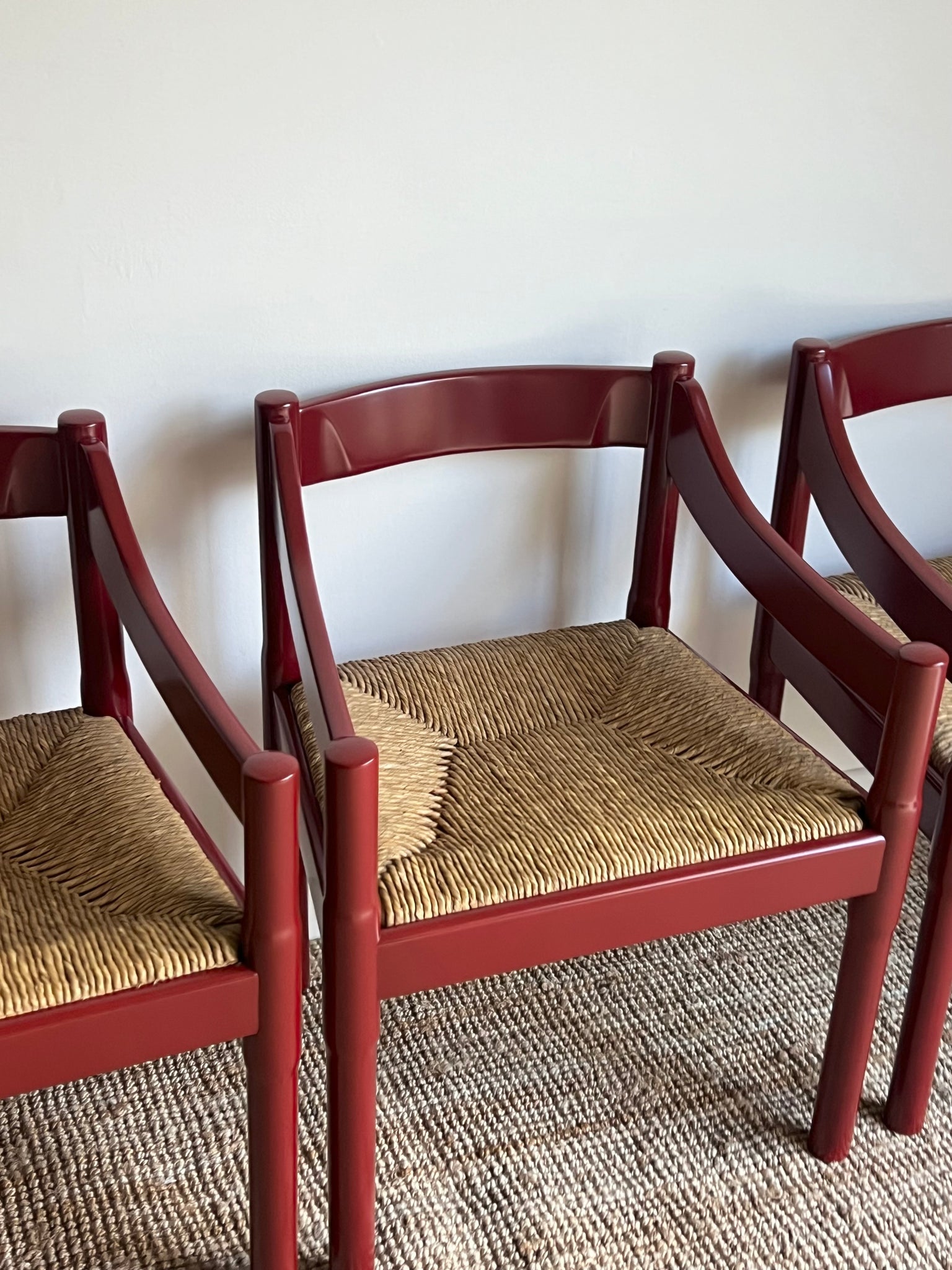 Set of x4 Oxblood Carimate Carver Chairs by Vico Magistretti