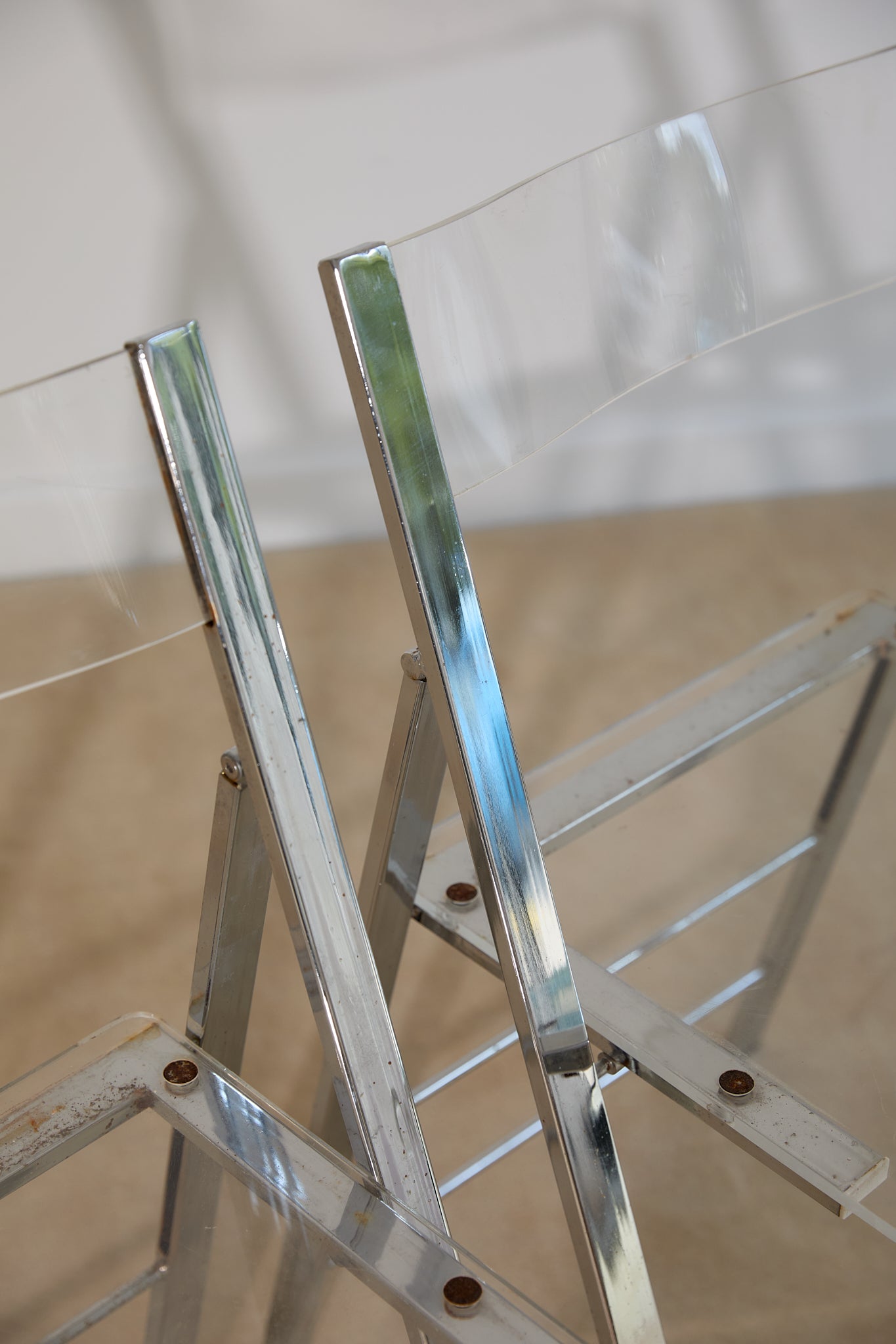 Pair of Lucite and Chrome Folding Chairs