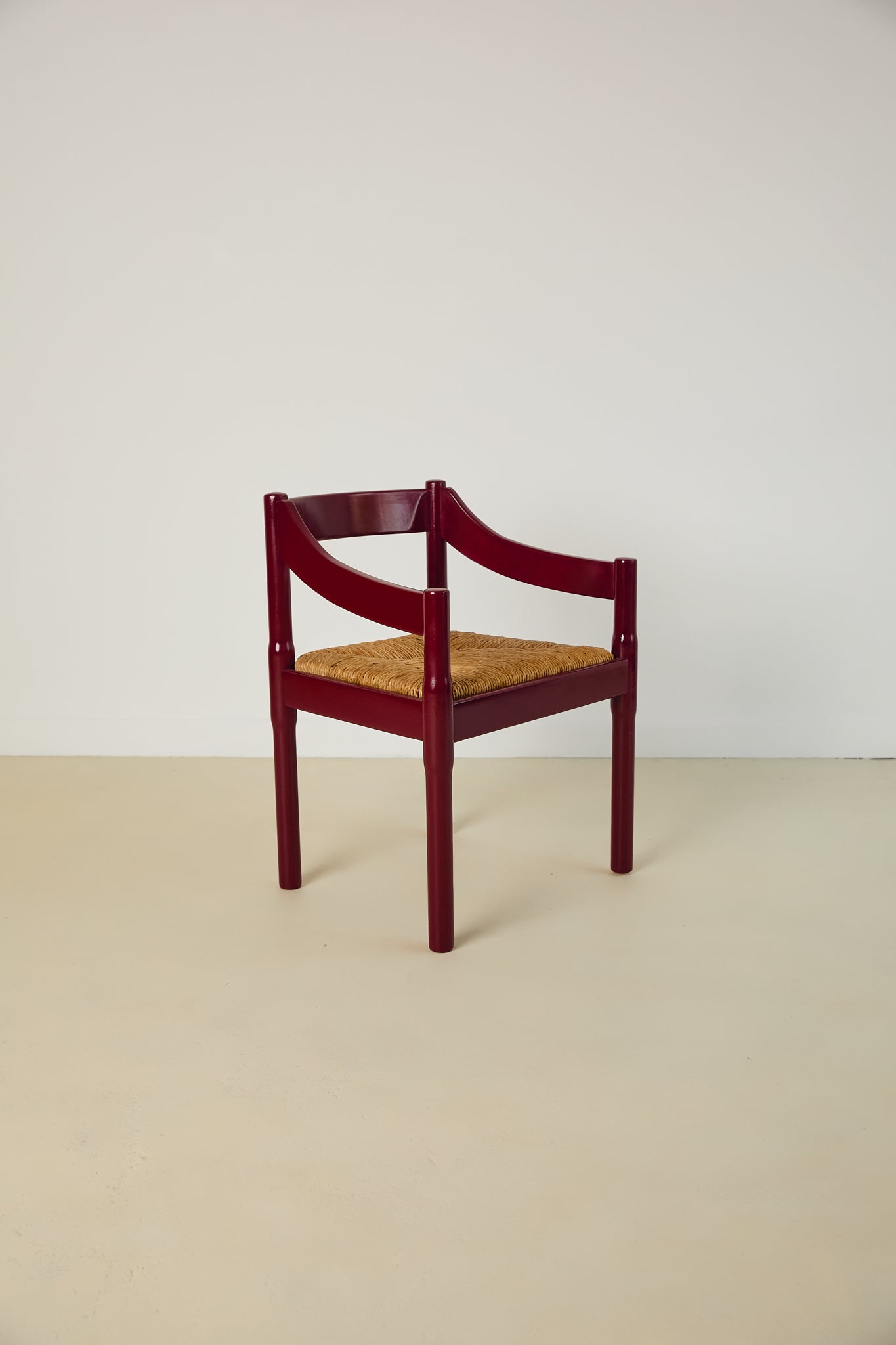 Set of x8 Burgundy Carimate Chairs by Vico Magistretti