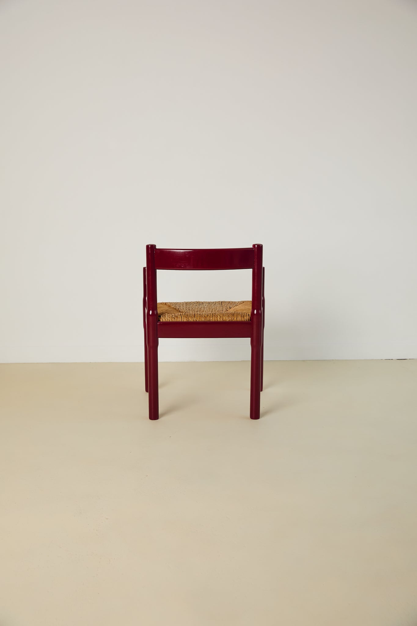 Set of x8 Burgundy Carimate Chairs by Vico Magistretti