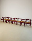 Set of x8 Burgundy Carimate Chairs by Vico Magistretti