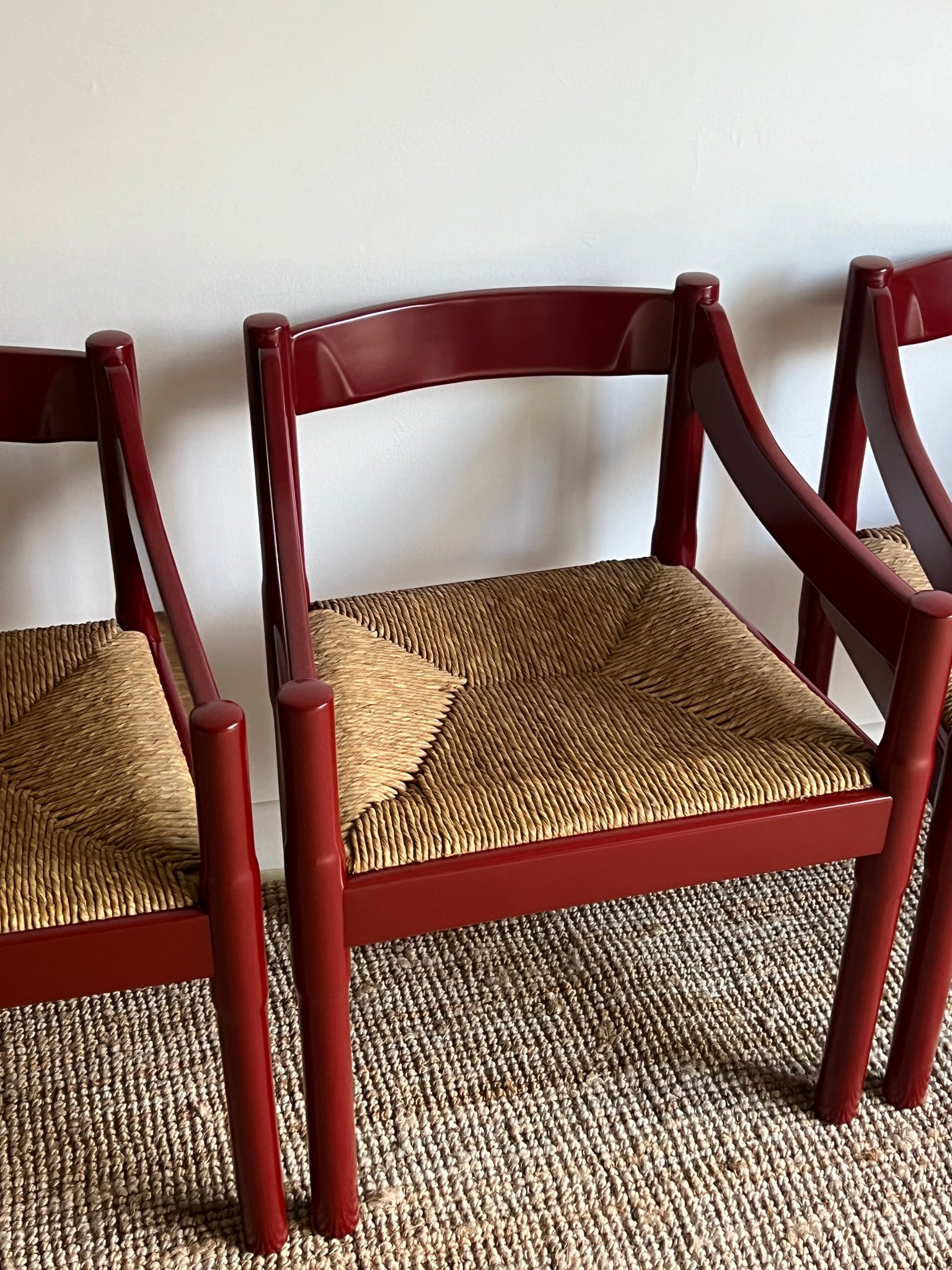 Set of x4 Oxblood Carimate Carver Chairs by Vico Magistretti