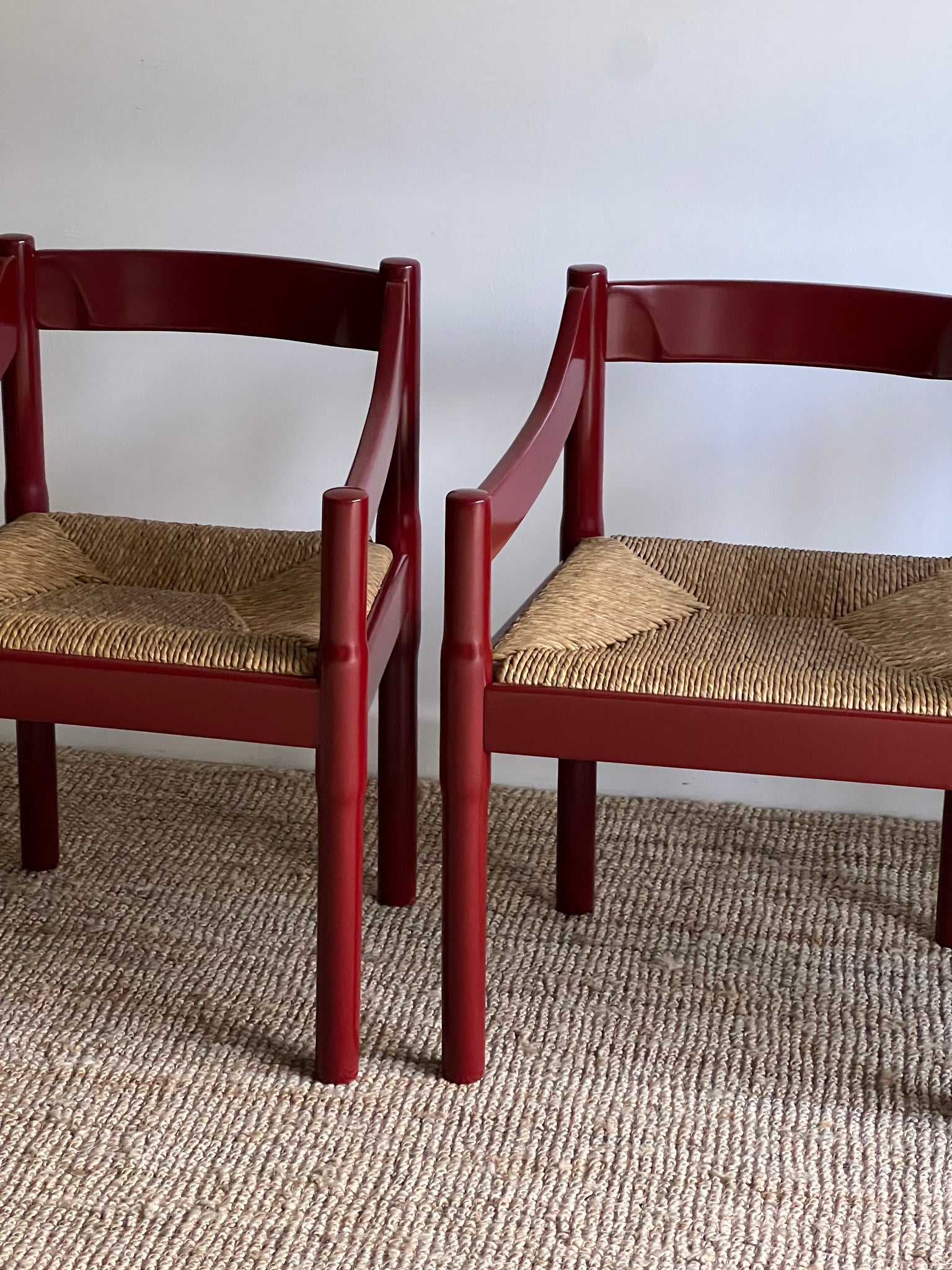 Set of x4 Oxblood Carimate Carver Chairs by Vico Magistretti