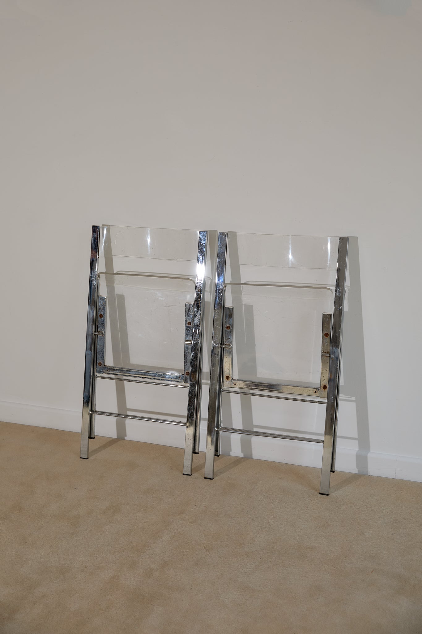 Pair of Lucite and Chrome Folding Chairs