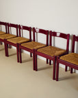 Set of x8 Burgundy Carimate Chairs by Vico Magistretti