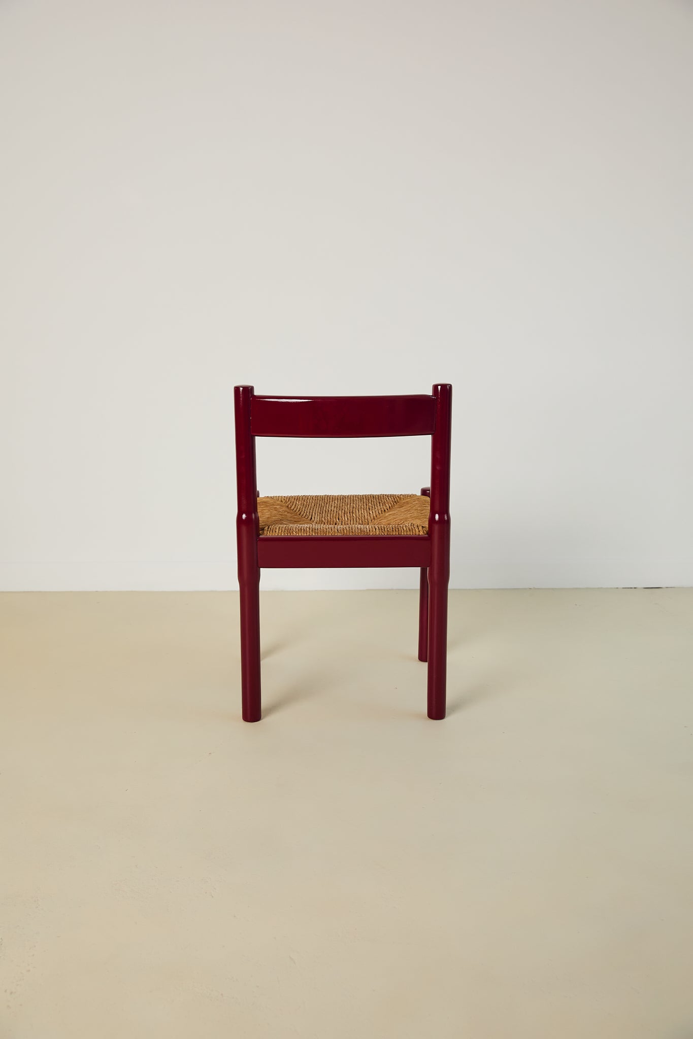 Set of x8 Burgundy Carimate Chairs by Vico Magistretti