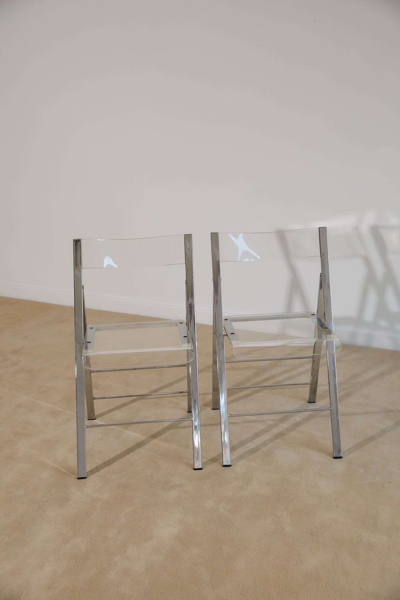 Pair of Lucite and Chrome Folding Chairs