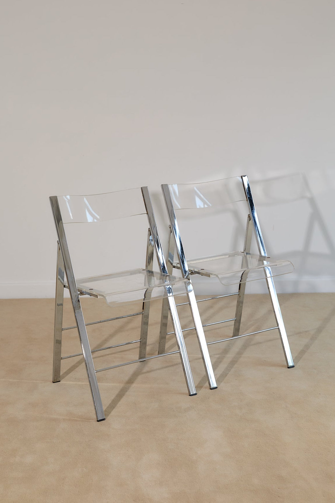 Pair of Lucite and Chrome Folding Chairs